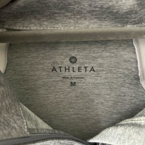 Athletica running wild 1/2 zip pullover.  Excellent condition no rips or stains.